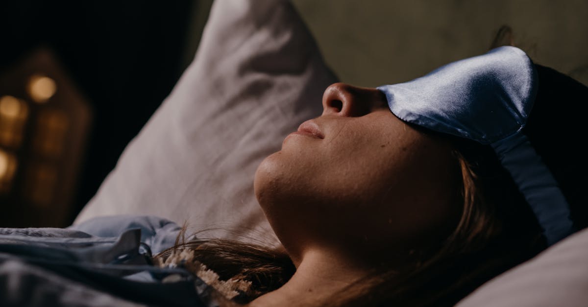 asleep woman wearing eye mask